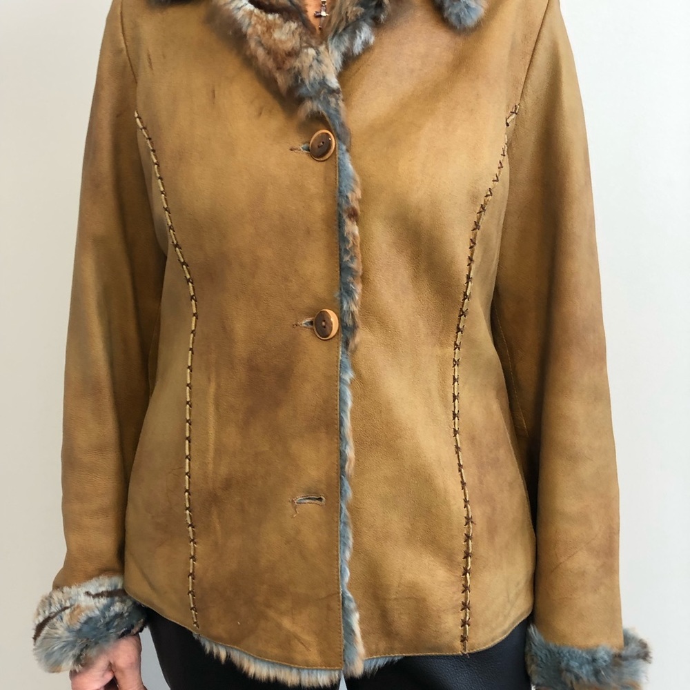 Ladies leather jacket with fur trim